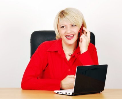 photodune-1328178-business-woman-with-phone-and-laptop-xs